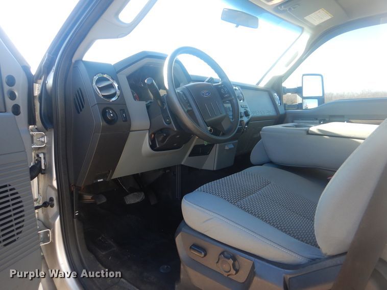 image for item AE9502 2014 Ford F550 Super Duty XLT  Crew Cab flatbed truck