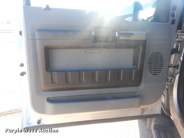 image for item AE9502 2014 Ford F550 Super Duty XLT  Crew Cab flatbed truck