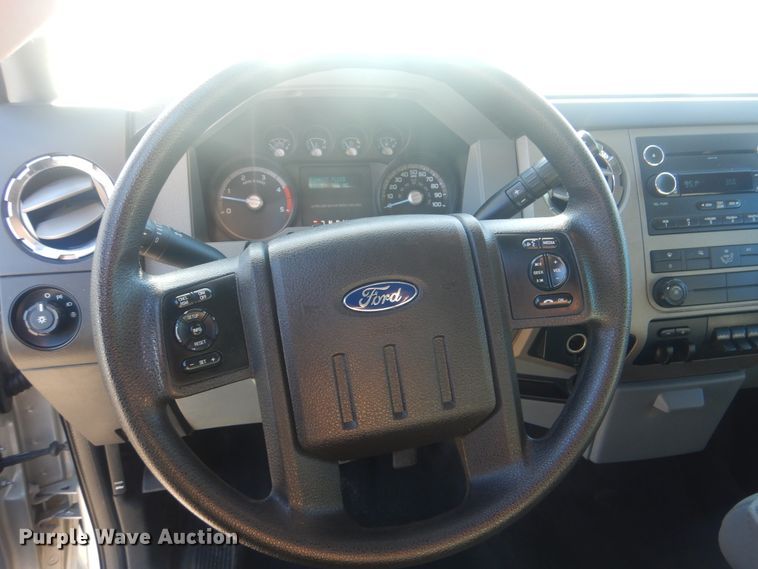 image for item AE9502 2014 Ford F550 Super Duty XLT  Crew Cab flatbed truck