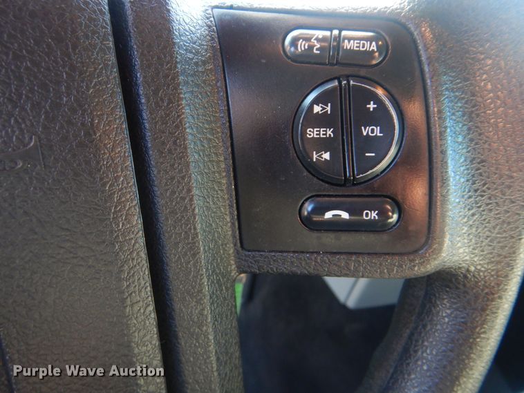 image for item AE9502 2014 Ford F550 Super Duty XLT  Crew Cab flatbed truck