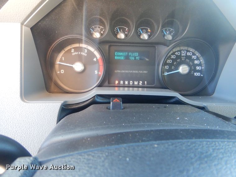 image for item AE9502 2014 Ford F550 Super Duty XLT  Crew Cab flatbed truck