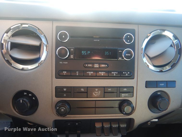 image for item AE9502 2014 Ford F550 Super Duty XLT  Crew Cab flatbed truck