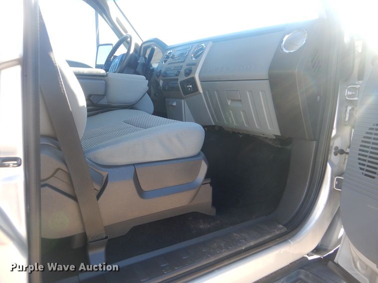 image for item AE9502 2014 Ford F550 Super Duty XLT  Crew Cab flatbed truck