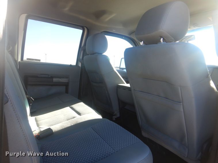 image for item AE9502 2014 Ford F550 Super Duty XLT  Crew Cab flatbed truck