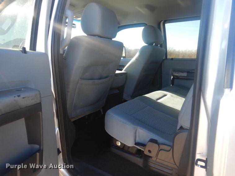 image for item AE9502 2014 Ford F550 Super Duty XLT  Crew Cab flatbed truck