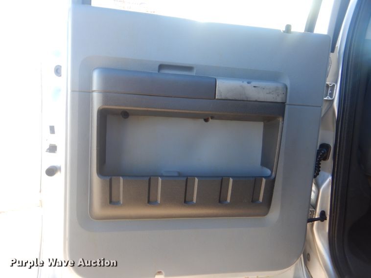 image for item AE9502 2014 Ford F550 Super Duty XLT  Crew Cab flatbed truck