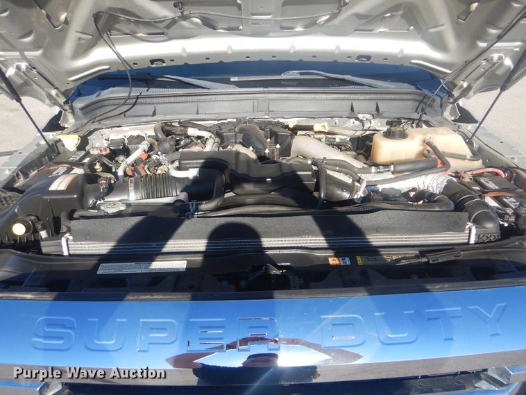 image for item AE9502 2014 Ford F550 Super Duty XLT  Crew Cab flatbed truck