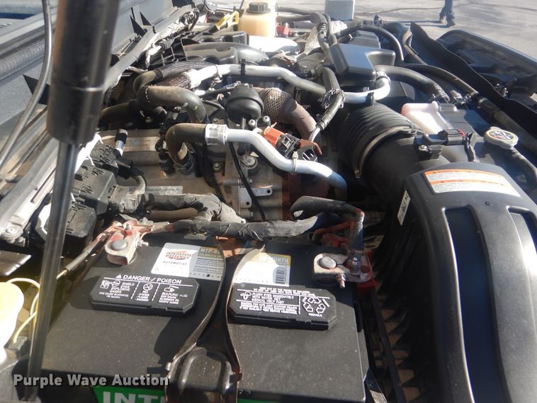 image for item AE9502 2014 Ford F550 Super Duty XLT  Crew Cab flatbed truck