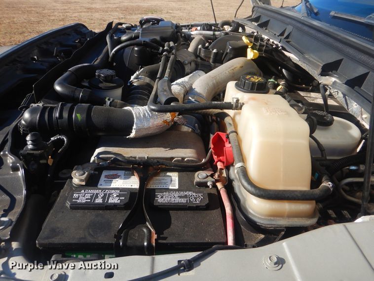 image for item AE9502 2014 Ford F550 Super Duty XLT  Crew Cab flatbed truck