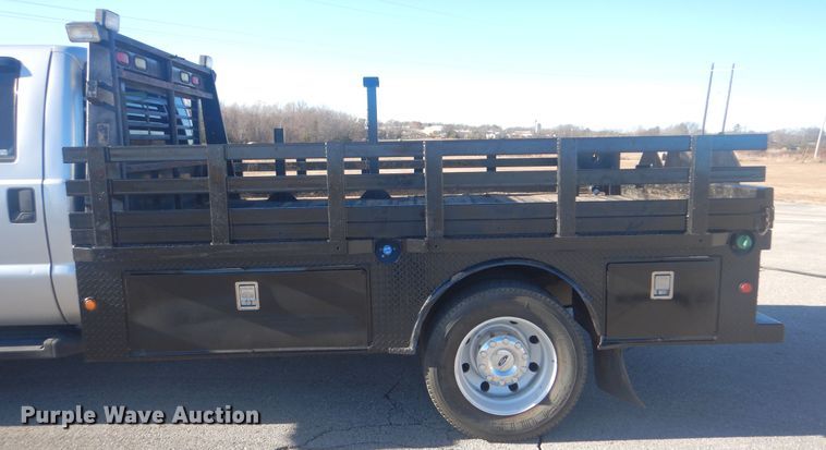 image for item AE9502 2014 Ford F550 Super Duty XLT  Crew Cab flatbed truck
