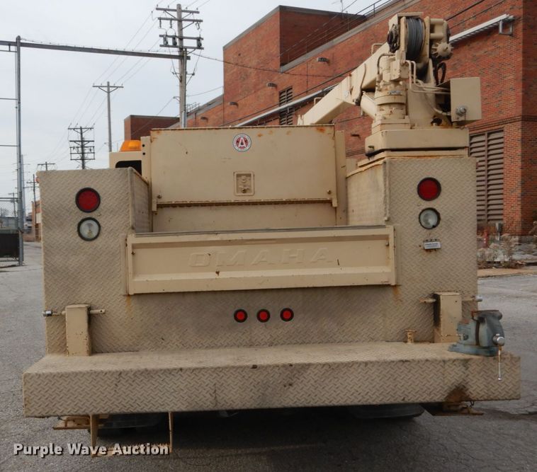 image for item DI1069 1997 GMC TopKick  utility truck with crane