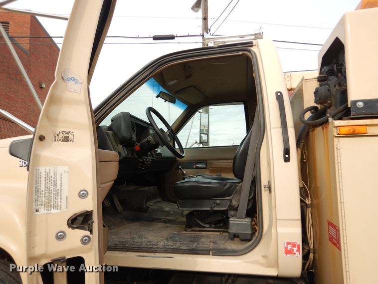 image for item DI1069 1997 GMC TopKick  utility truck with crane