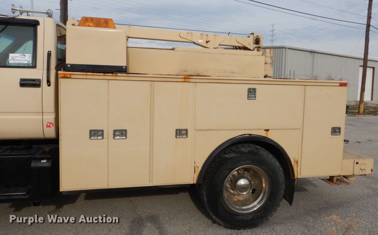 image for item DI1069 1997 GMC TopKick  utility truck with crane