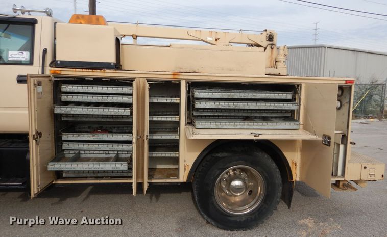 image for item DI1069 1997 GMC TopKick  utility truck with crane