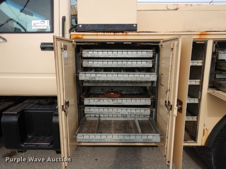 image for item DI1069 1997 GMC TopKick  utility truck with crane