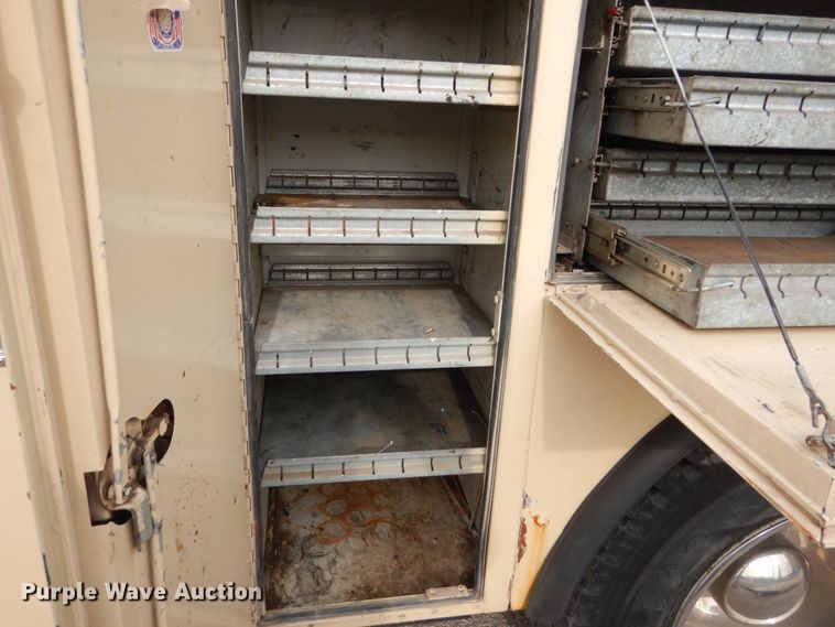 image for item DI1069 1997 GMC TopKick  utility truck with crane