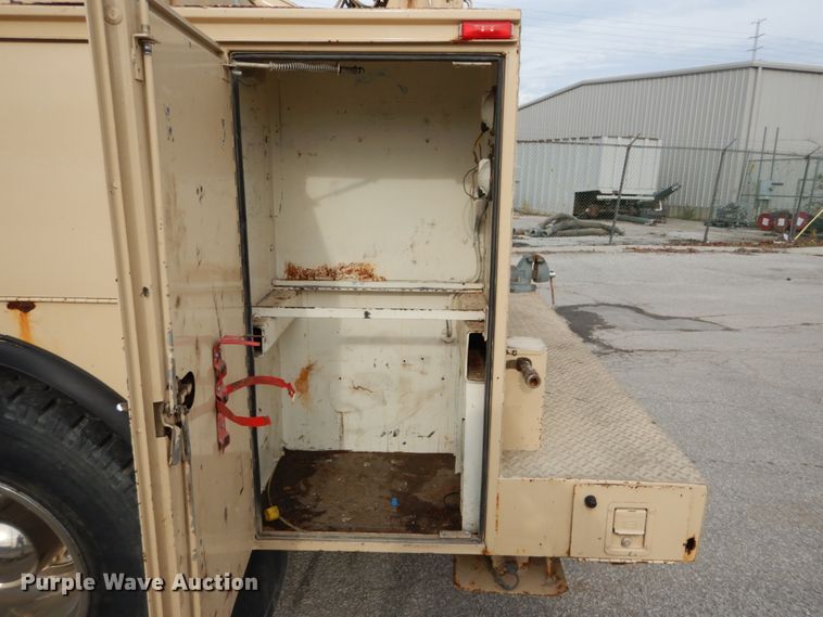 image for item DI1069 1997 GMC TopKick  utility truck with crane