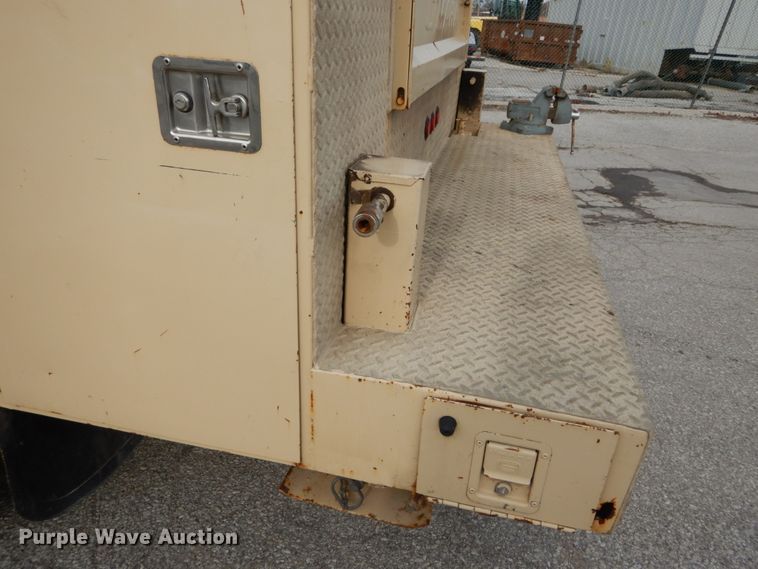 image for item DI1069 1997 GMC TopKick  utility truck with crane