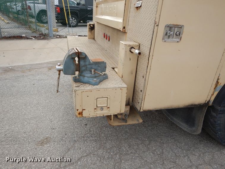 image for item DI1069 1997 GMC TopKick  utility truck with crane