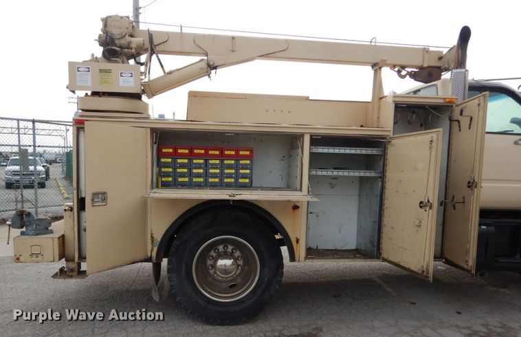 image for item DI1069 1997 GMC TopKick  utility truck with crane