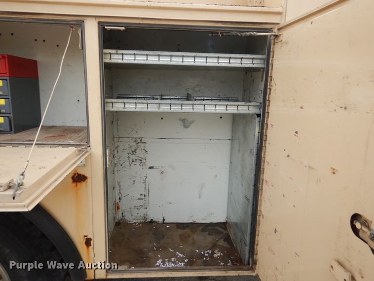 image for item DI1069 1997 GMC TopKick  utility truck with crane