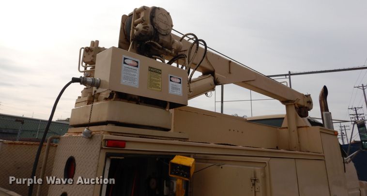 image for item DI1069 1997 GMC TopKick  utility truck with crane