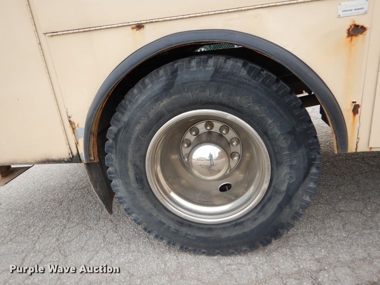 image for item DI1069 1997 GMC TopKick  utility truck with crane