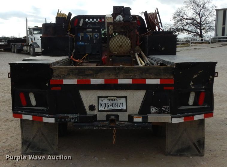 image for item DJ8081 2015 Dodge Ram 5500HD  Crew Cab flatbed truck