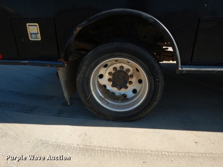 image for item DJ8097 2012 Dodge Ram 5500HD  Crew Cab flatbed truck