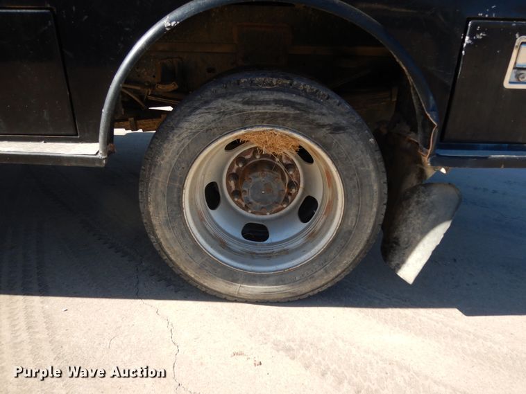 image for item DJ8097 2012 Dodge Ram 5500HD  Crew Cab flatbed truck