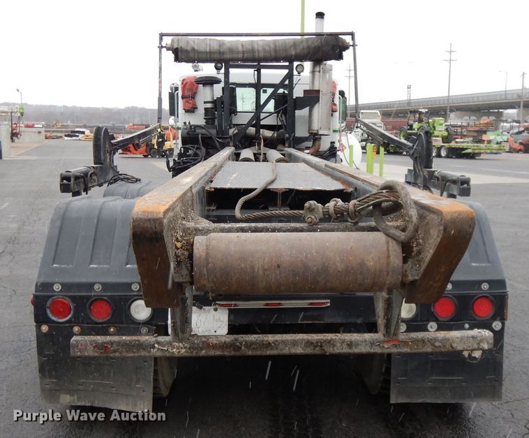 image for item GH9069 1993 Peterbilt 320  roll-off container truck