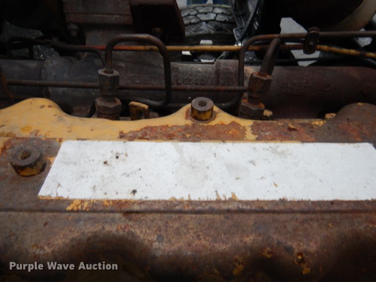 image for item GH9069 1993 Peterbilt 320  roll-off container truck