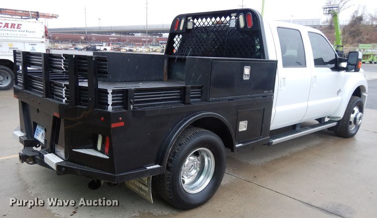 image for item GH9094 2011 Ford F450 Super Duty Lariat  Crew Cab flatbed truck