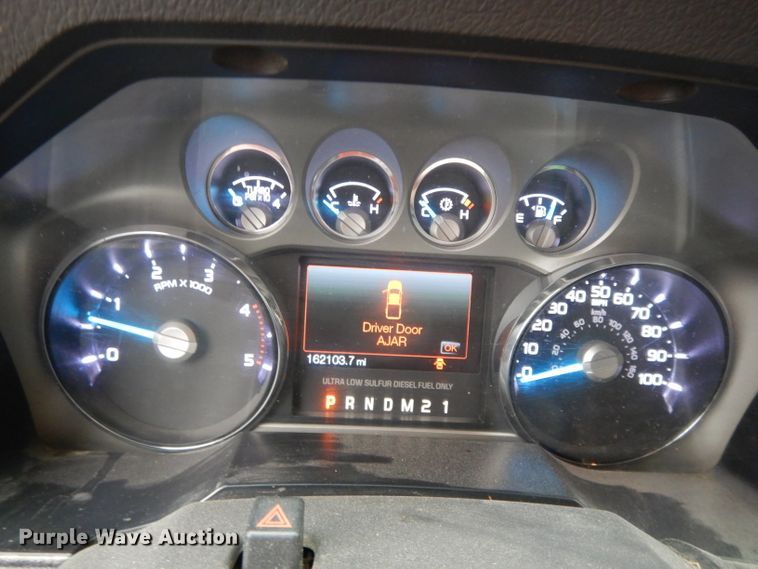 image for item GH9094 2011 Ford F450 Super Duty Lariat  Crew Cab flatbed truck