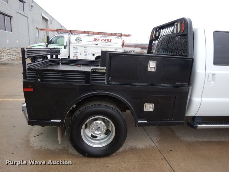 image for item GH9094 2011 Ford F450 Super Duty Lariat  Crew Cab flatbed truck