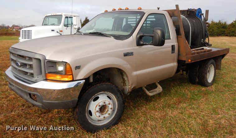 image for item GK9552 1999 Ford F450 Super Duty  flatbed truck