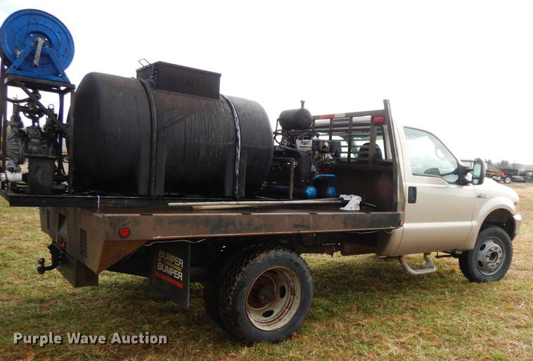 image for item GK9552 1999 Ford F450 Super Duty  flatbed truck