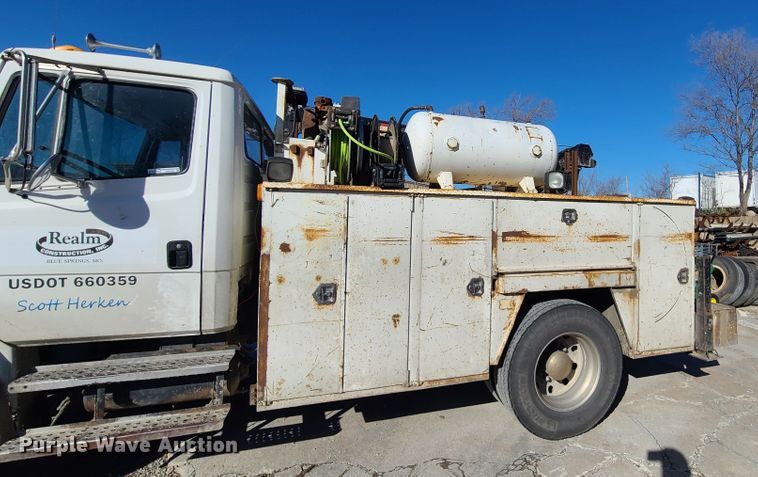 image for item HM9336 2001 Freightliner FL70  service truck with crane