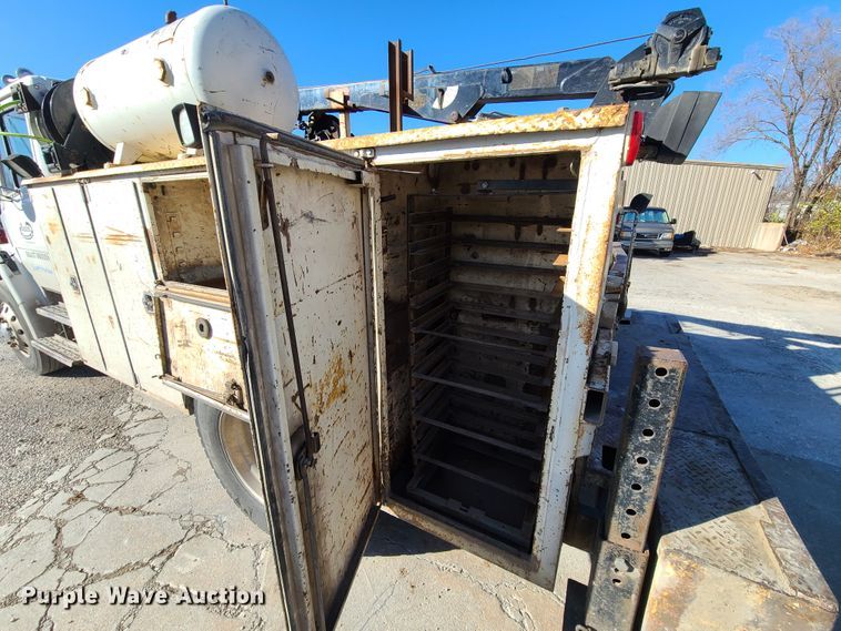 image for item HM9336 2001 Freightliner FL70  service truck with crane