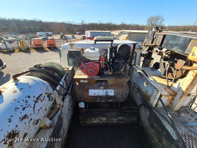 image for item HM9336 2001 Freightliner FL70  service truck with crane