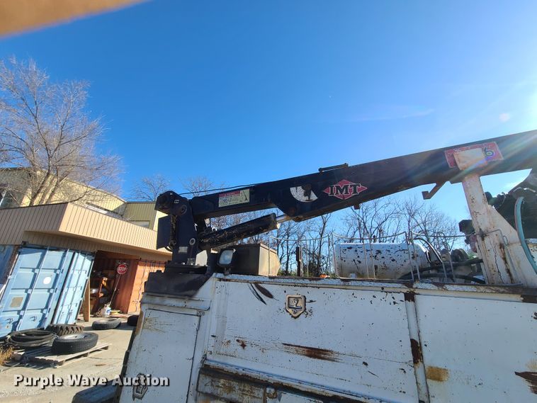 image for item HM9336 2001 Freightliner FL70  service truck with crane