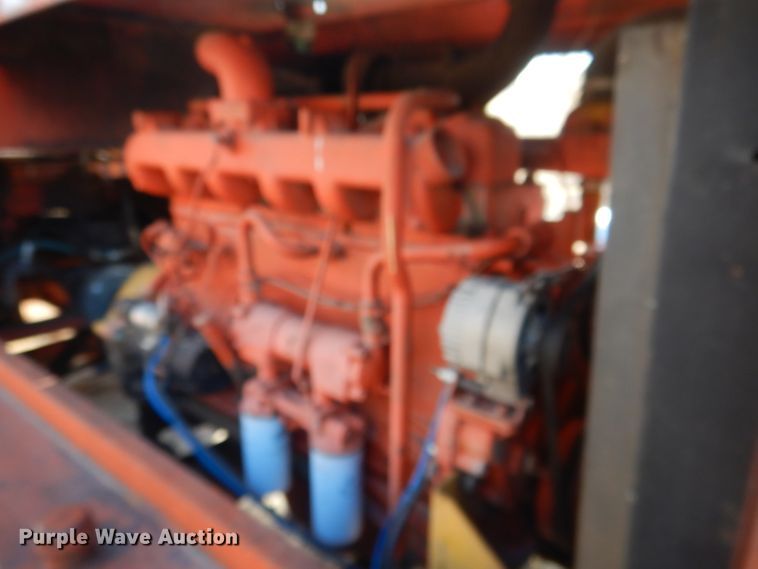 image for item DG4667 Farmland F903 bale processor