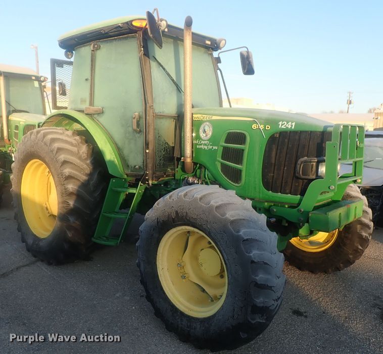 image for item DI7432 2011 John Deere 6115D  MFWD tractor