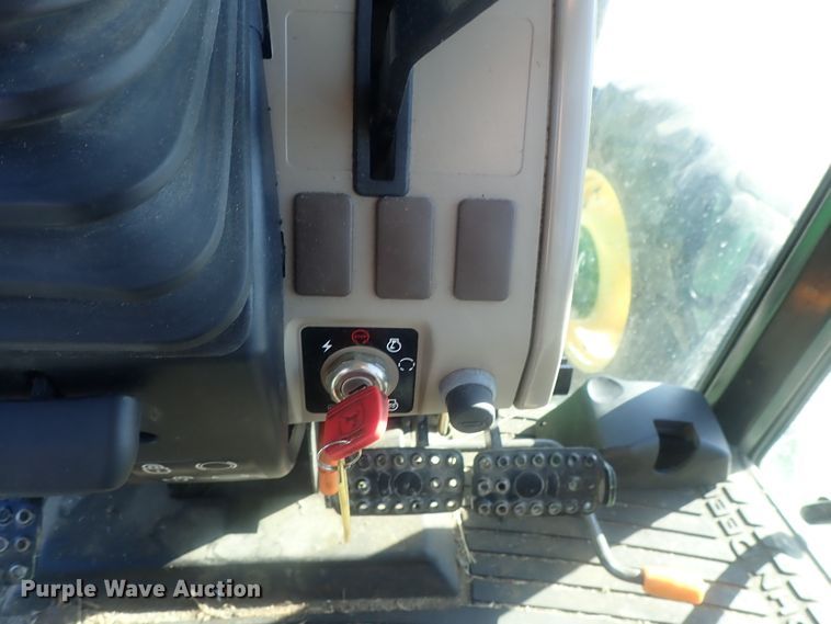 image for item DI7432 2011 John Deere 6115D  MFWD tractor