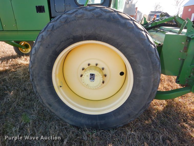 image for item DI8440 2011 John Deere R450  windrower