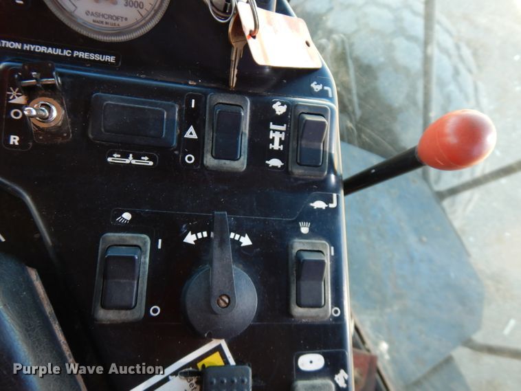 image for item GK9493 1999 Hesston 8550  windrower