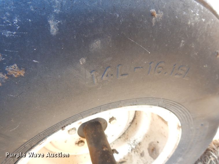 image for item GK9493 1999 Hesston 8550  windrower