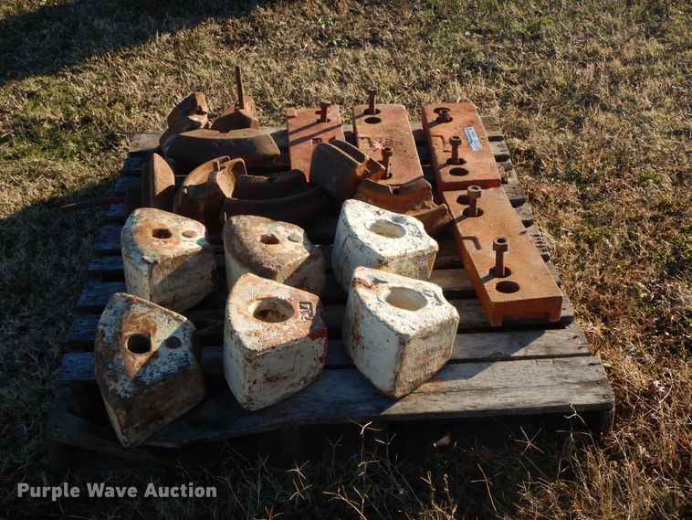 image for item GK9665 Approximately 16 Allis Chalmers weights