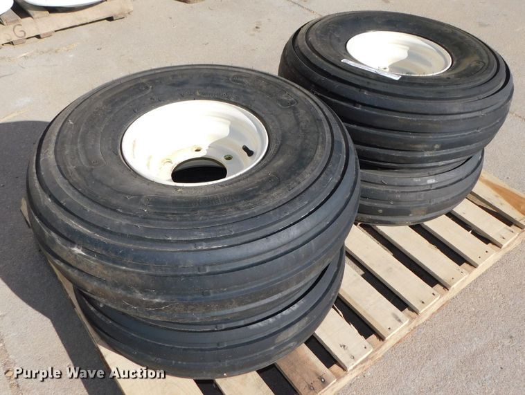 image for item GQ9898 (4) American Farmer 9.00-10 tires and wheels