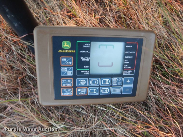 image for item HW9148 2018 John Deere 560M  round baler